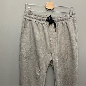 Gray sweatpants with multiple pockets